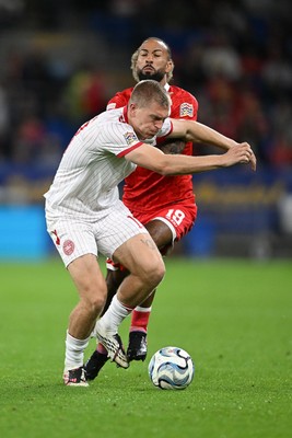 041026 - Wales v Denmark - UEFA Nations League - Sorba Thomas of Wales is challenged by Rasmus Kristensen of Denmark