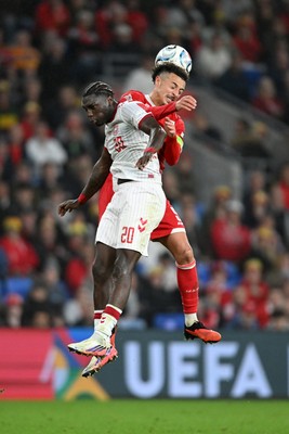 041026 - Wales v Denmark - UEFA Nations League - Ethan Ampadu of Wales is challenged by Mohamed Daramy of Denmark