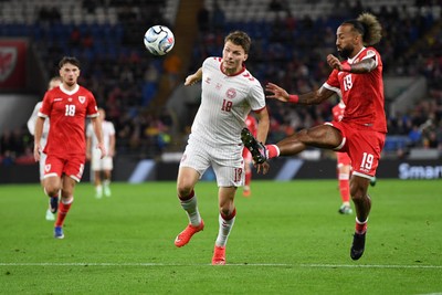 041026 - Wales v Denmark - UEFA Nations League - Sorba Thomas of Wales is challenged by Anton Gaaei of Denmark