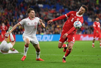041026 - Wales v Denmark - UEFA Nations League - Ethan Ampadu of Wales is challenged by  Anton Gaaei of Denmark