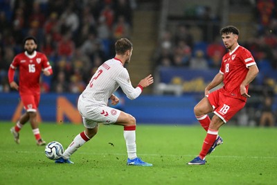 041026 - Wales v Denmark - UEFA Nations League - Mark Harris of Wales is challenged by Joachim Andersen of Denmark