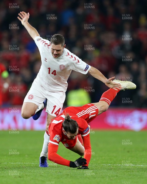161118 - Wales v Denmark - UEFA Nations League B - Gareth Bale of Wales is tackled by Henrik Dalsgaard of Denmark