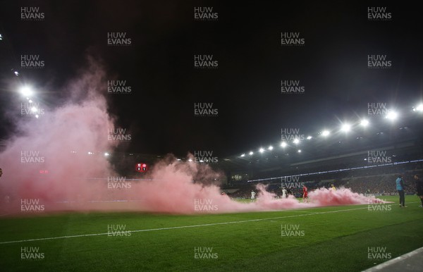 161118 - Wales v Denmark - UEFA Nations League B - A flare is thrown onto the pitch