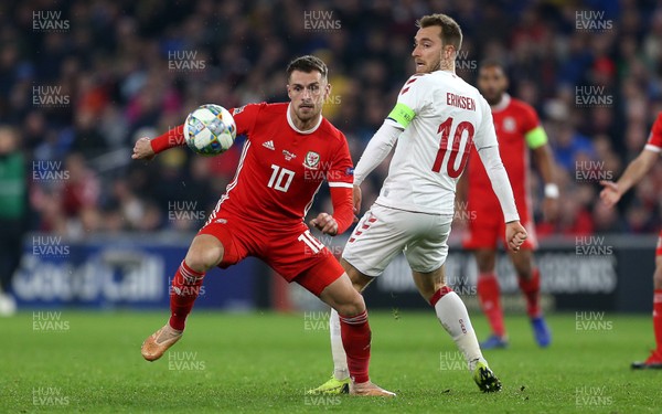 161118 - Wales v Denmark - UEFA Nations League B - Aaron Ramsey of Wales is challenged by Christian Eriksen of Denmark