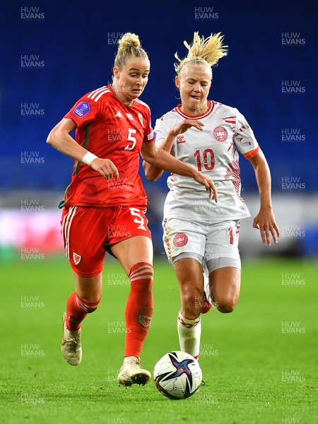260923 - Wales v Denmark - UEFA Women’s Nations League - Rhiannon Roberts of Wales and Pernille Harder of Denmark