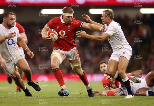 050823 - Wales v England - Vodafone Summer Series - Aaron Wainwright of Wales is tackled by Max Malins of England 