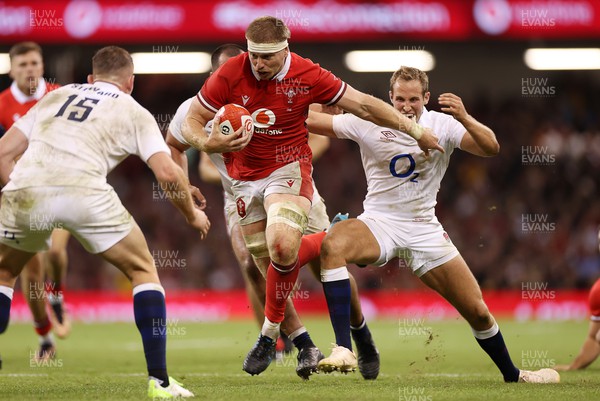 050823 - Wales v England - Vodafone Summer Series - Aaron Wainwright of Wales is tackled by Max Malins of England 