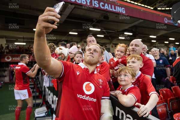 050823 - Wales v England - Vodafone Summer Series - Corey Domachowski of Wales with fans at full time