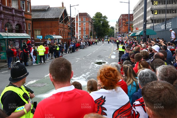 050823 - Wales v England - Summer Series - Fans line Westgate street to catch a glimpse as the bus of England arrives