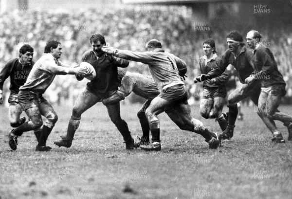 070387 - Wales v England - Five Nations - Stuart Evans of Wales is tackled by Gareth Chilcott and Gary Pearce