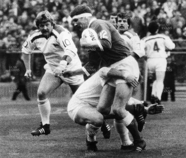 081181 - Wales v England - Rugby League International - Glyn Shaw of Wales is tackled by Dave Ward of England with John Millington moving in