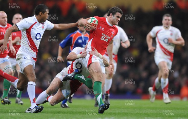 14.02.09 - Wales v England - RBS Six Nations 2009 - Wales' Jamie Roberts is tackled by England's Harry Ellis. 