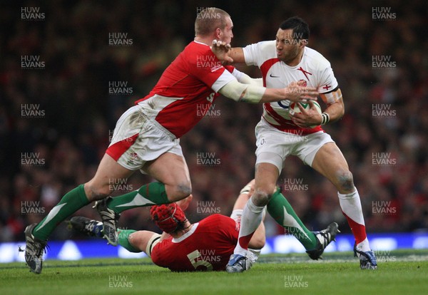 14.02.09 - Wales v England, RBS Six Nations 2009. - England's Riki Flutey is tackled by Wales' Gethin Jenkins   