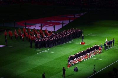 150325 - Wales v England - Guinness Six Nations - The Wales team sings their national anthem prior to the game