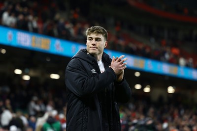 150325 - Wales v England - Guinness Six Nations - Tommy Freeman of England applauds the fans following the team's victory