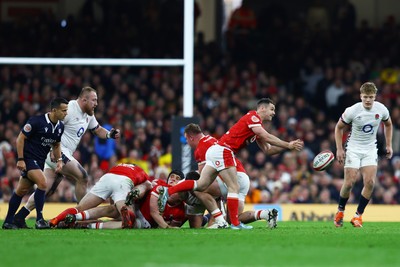 150325 - Wales v England - Guinness Six Nations - Tomos Williams of Wales offloads from the ruck