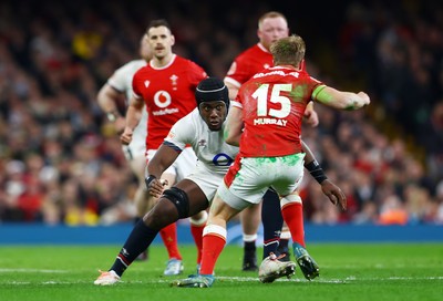 150325 - Wales v England - Guinness Six Nations - Blair Murray of Wales is tackled by Maro Itoje of England