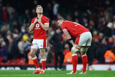 150325 - Wales v England - Guinness Six Nations - Gareth Anscombe and Will Rowlands of Wales look dejected following the team's defeat