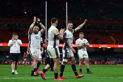 150325 - Wales v England - Guinness Six Nations - Joe Heyes and Fraser Dingwall of England acknowledge the fans following the team's victory