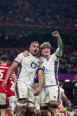 150325 - Wales v England - Guinness Six Nations -  Chandler Cunningham South and Henry Pollock celebrate after Chandler Cunningham South’s second half try after England go on to beat Wales 