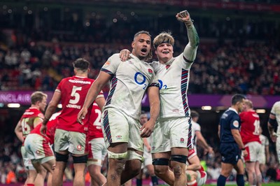 150325 - Wales v England - Guinness Six Nations -  Chandler Cunningham South and Henry Pollock celebrate after Chandler Cunningham South’s second half try after England go on to beat Wales 