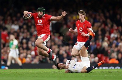 150325 - Wales v England - Guinness Six Nations Championship - Nicky Smith of Wales is challenged by Alex Mitchell of England 