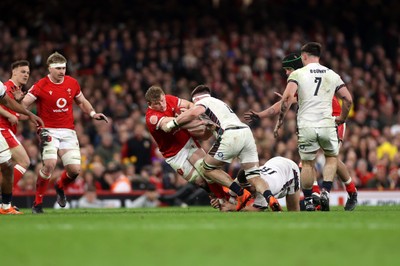 150325 - Wales v England - Guinness Six Nations Championship - Jac Morgan of Wales is tackled by Ben Earl of England 