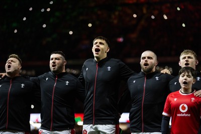 150325 - Wales v England - Guinness Six Nations Championship - Dafydd Jenkins of Wales sings the anthem