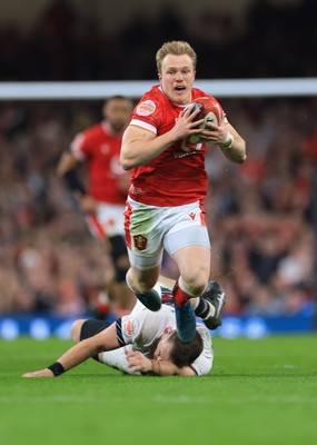 150325 Wales v England, Guinness Mens Six Nations - Blair Murray of Wales is tackled by Luke Cowan-Dickie of England