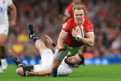 150325 Wales v England, Guinness Mens Six Nations - Blair Murray of Wales is tackled by Luke Cowan-Dickie of England