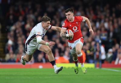 150325 Wales v England, Guinness Mens Six Nations - Joe Roberts of Wales takes on Tommy Freeman of England