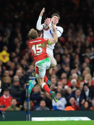 150325 Wales v England, Guinness Mens Six Nations - Blair Murray of Wales and Tom Roebuck of England compete for the ball