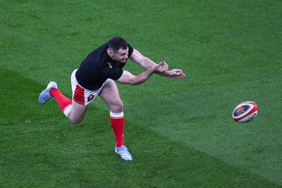 150325 - Wales v England - Guinness Six Nations - Tomos Williams of Wales warms up ahead of the match