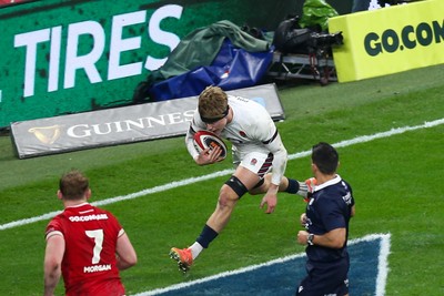 150325 - Wales v England - Guinness Six Nations - Henry Pollock of England goes over for a try