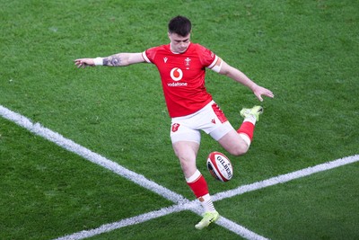 150325 - Wales v England - Guinness Six Nations - Joe Roberts of Wales kicks the ball