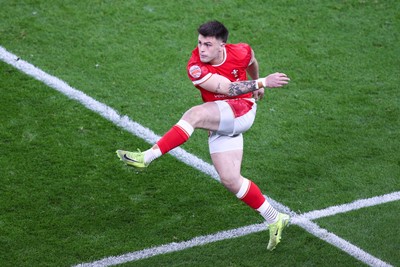 150325 - Wales v England - Guinness Six Nations - Joe Roberts of Wales kicks the ball