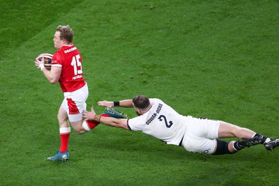 150325 - Wales v England - Guinness Six Nations - Luke Cowan-Dickie of England tap tackles Blair Murray of Wales as he breaks clear