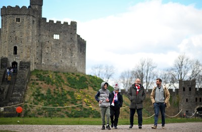 150325 - Wales v England - Guinness Six Nations - Fans make their way past Cardiff Castle ahead of kick off 