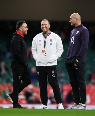 150325 - Wales v England - Guinness Six Nations - Matt Sherratt, Interim Head Coach of Wales (L) interacts with Steve Borthwick, Head Coach of England (R)