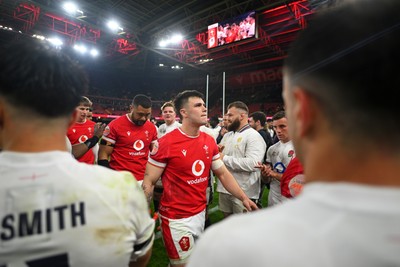 150325 - Wales v England - Guinness Six Nations - Players of Wales make their way off following the end