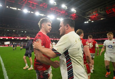 150325 - Wales v England - Guinness Six Nations - Aaron Wainwright of Wales and Jamie George of England interact