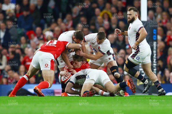 150325 - Wales v England - Guinness Six Nations - Ellis Mee of Wales is tackled