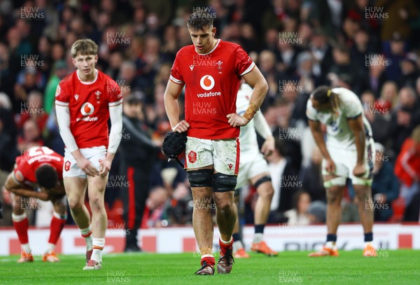 150325 - Wales v England - Guinness Six Nations - Dafydd Jenkins of Wales looks dejected following the team's defeat