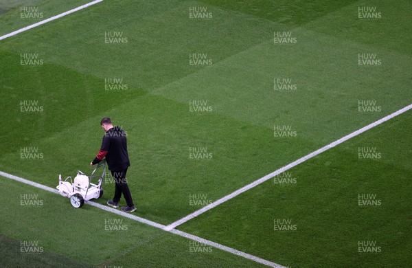 150325 - Wales v England - Guinness Six Nations Championship - Ground staff prepare the ground before the game