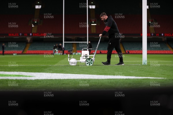 150325 - Wales v England - Guinness Six Nations Championship - Ground staff prepare the ground before the game