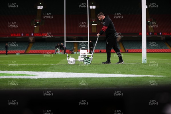 150325 - Wales v England - Guinness Six Nations Championship - Ground staff prepare the ground before the game