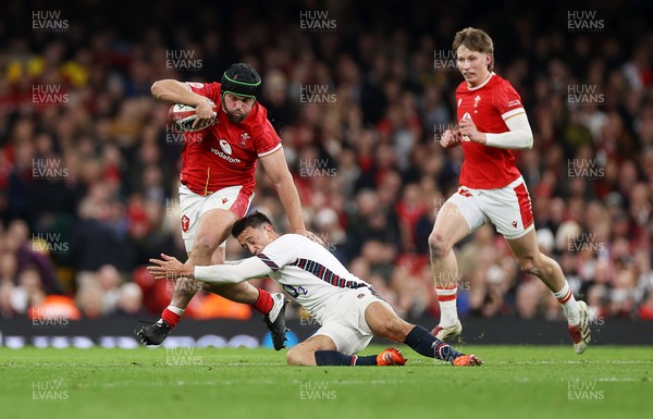 150325 - Wales v England - Guinness Six Nations Championship - Nicky Smith of Wales is challenged by Alex Mitchell of England 