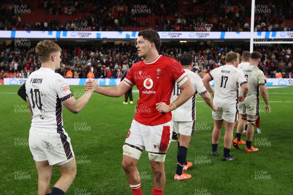 150325 - Wales v England - Guinness Six Nations Championship - Fin Smith of England and Teddy Williams of Wales at full time