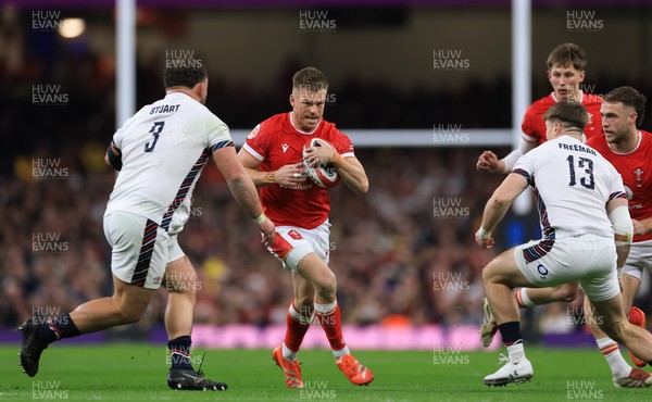 150325 Wales v England, Guinness Mens Six Nations - Gareth Anscombe of Wales takes on Will Stuart of England and Tommy Freeman of England