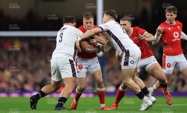 150325 Wales v England, Guinness Mens Six Nations - Gareth Anscombe of Wales takes on Will Stuart of England and Tommy Freeman of England